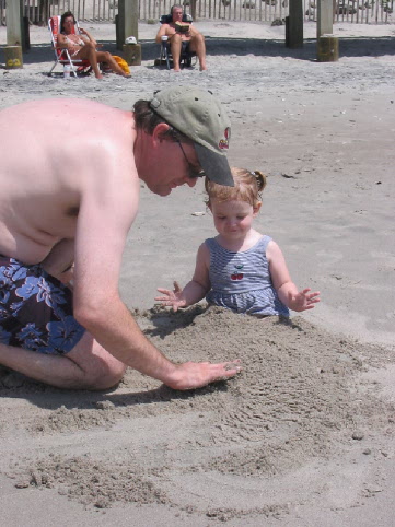 2004_08_17 NC Randy burying Jane in the sand.jpg